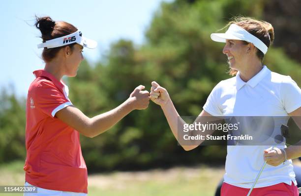 Meghan MacLaren and Florentyna Parker of England celebrate on the fifth hole during Day One of the GolfSixes at Oitavos Dunes on June 07, 2019 in...