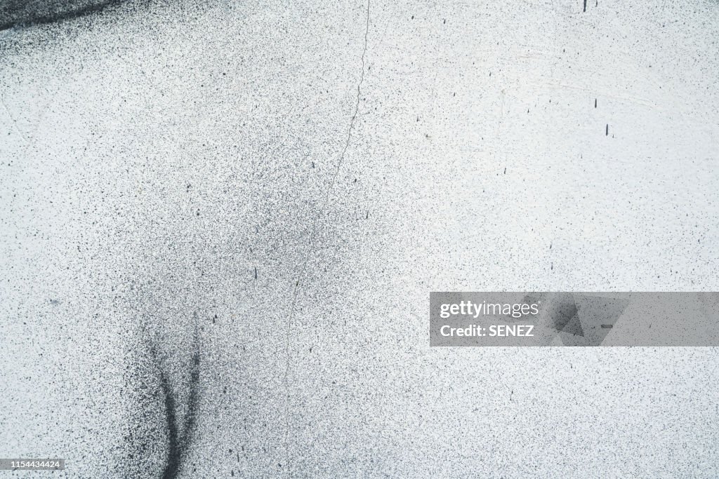 Close-Up Of Spray Paint On White Wall