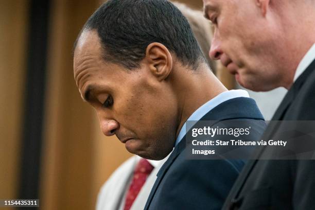 Former Minneapolis police officer Mohamed Noor reads a statement before being sentenced by Judge Kathryn Quaintance in the fatal shooting of Justine...