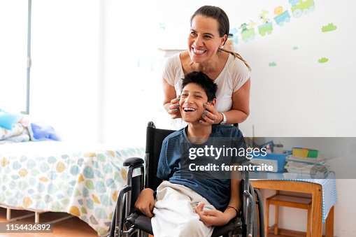 Therapist doing facial massage to a child with Cerebral Palsy Therapist doing facial massage to a child with Cerebral Palsy
