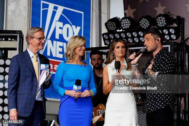 Hosts Steve Doocy, Ainsley Earhardt, Jillian Mele and Michael Ray attend FOX News Channel's "Fox & Friends" All-American Summer Concert Series...