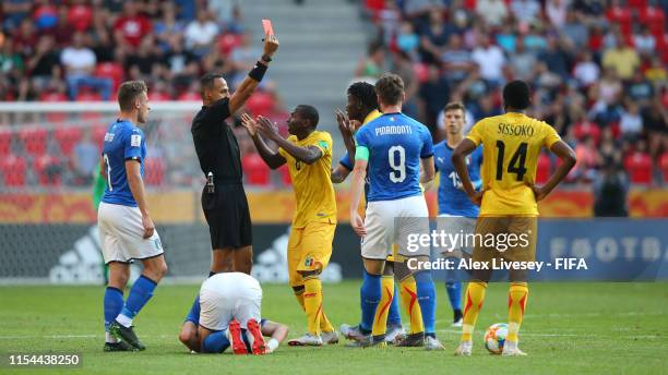 Ousmane Diakite of Mali is shown a red card by referee Ismail Elfath during the 2019 FIFA U-20 World Cup Quarter Final match between Italy and Mali...