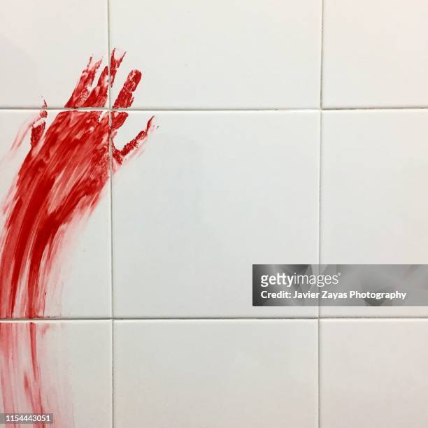 imprint of a bloody hand - zombie stock pictures, royalty-free photos & images