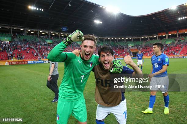 Alessandro Plizzari and Roberto Alberico of Italy celebrate following their team's victory in the 2019 FIFA U-20 World Cup Quarter Final match...