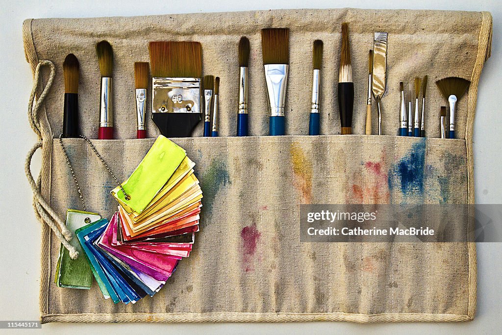 Paintbrushes in cloth holder