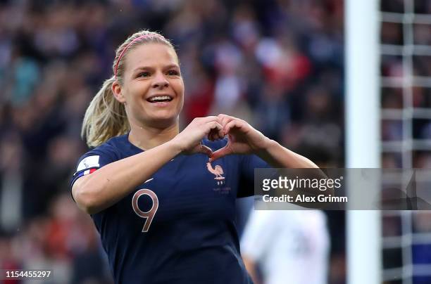 Eugenie Le Sommer of France celebrates after scoring her team's first goal during the 2019 FIFA Women's World Cup France group A match between France...