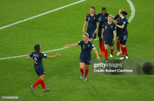 Amandine Henry of France celebrates with teammates after scoring her team's fourth goal during the 2019 FIFA Women's World Cup France group A match...