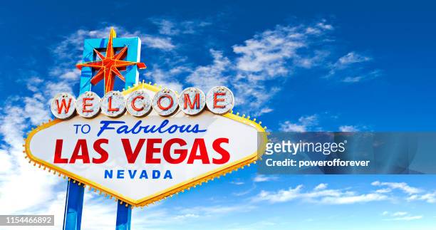 welcome to fabulous las vegas sign on blue sky - vegas sign stock pictures, royalty-free photos & images