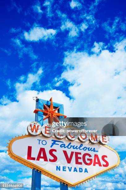 welcome to fabulous las vegas sign on blue sky - las vegas sign stock pictures, royalty-free photos & images