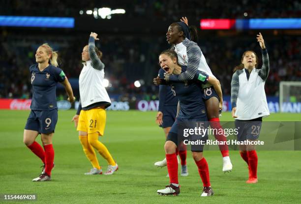 Elise Bussaglia and Viviane Asseyi of France celebrate following the 2019 FIFA Women's World Cup France group A match between France and Korea...