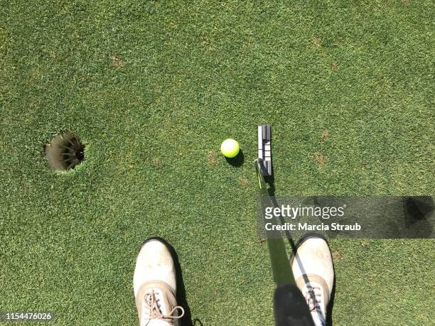 lining up the putt - golf accessories stock pictures, royalty-free photos & images