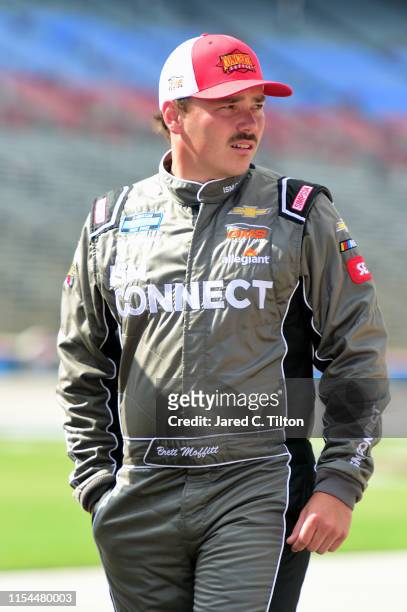 Brett Moffitt, driver of the Central Plains Cement Company Chevrolet, looks on during US Concrete Qualifying Day for the NASCAR Gander Outdoors Truck...