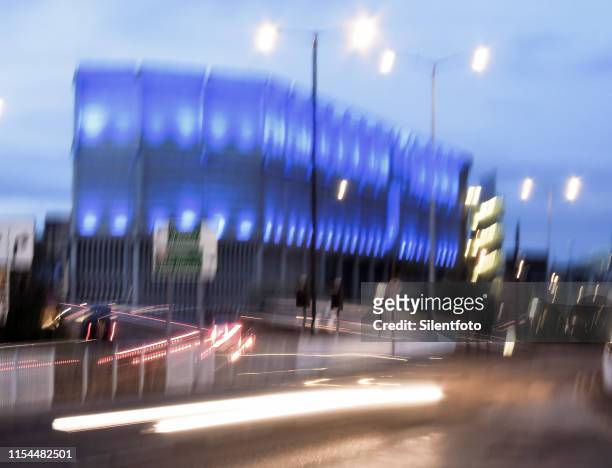 shaky view of power plant and dual carriageway at dusk - shaky stock pictures, royalty-free photos & images