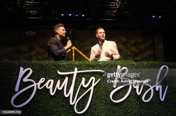 Ryan Seacrest and QVC's Rob Robillard speak on stage as QVC presents Beauty Bash at The Fillmore Philadelphia on June 07, 2019 in Philadelphia,...