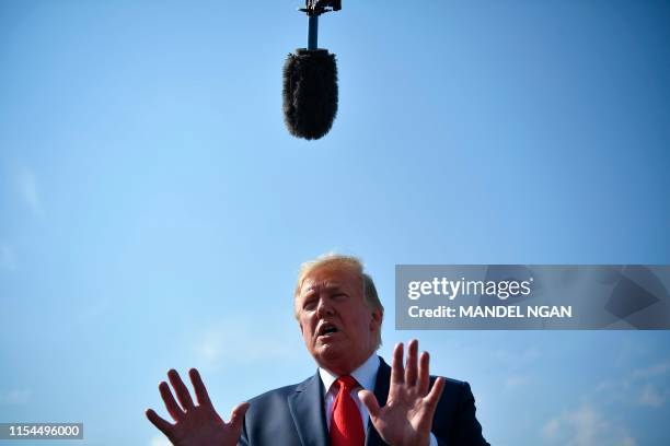 President Donald Trump speaks to the press before departing from Morristown Municipal Airport in Morristown, New Jersey on July 7, 2019. - Trump is...
