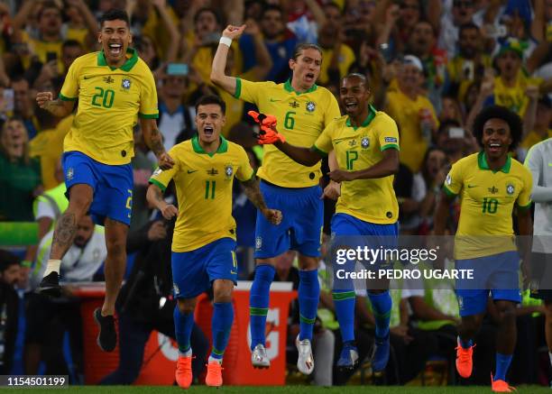 Brazil's Roberto Firmino, Philippe Coutinho, Filipe Luis, Fernandinho and Willian celebrate after winning the Copa America after defeating Peru 3-1...