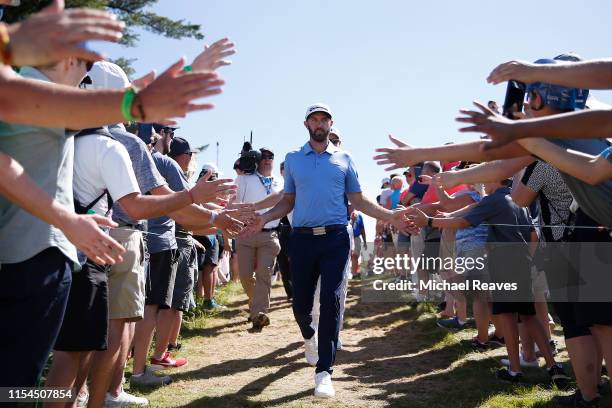 Dustin Johnson of the United States walks to the 13th tee during the second round of the RBC Canadian Open at Hamilton Golf and Country Club on June...