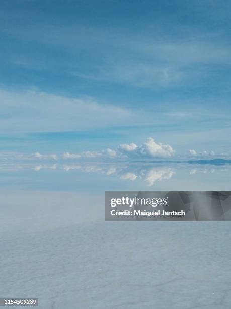 reflections of the sky in salar de uyuni. - inca people stock pictures, royalty-free photos & images