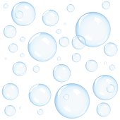 Close up of various sizes bubbles on white background