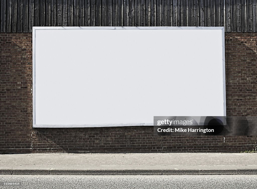 Blank Billboard On Brick Wall