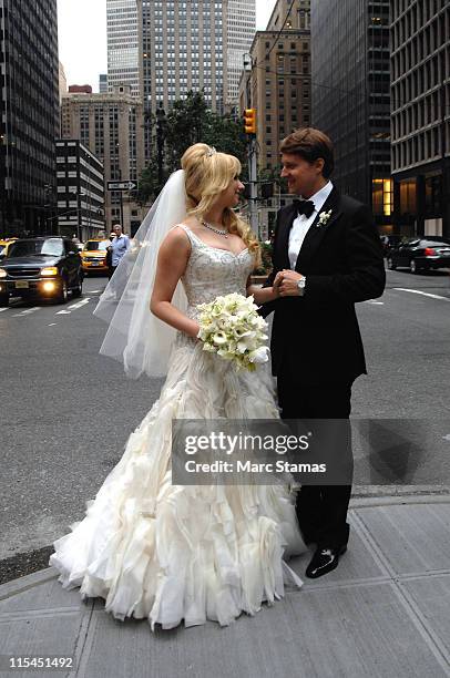 Andrea Catsimatidis and Christopher Nixon Cox pose outside The Waldorf-Astoria on June 4, 2011 in New York City.