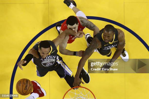 Fred VanVleet of the Toronto Raptors takes an elbow from Shaun Livingston of the Golden State Warriors in the second half during Game Four of the...