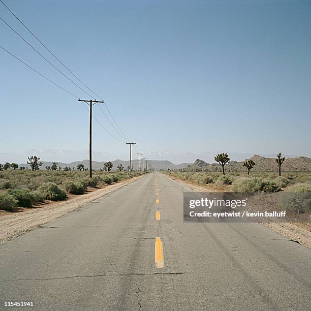 desert road vanishing point - lancaster stock pictures, royalty-free photos & images