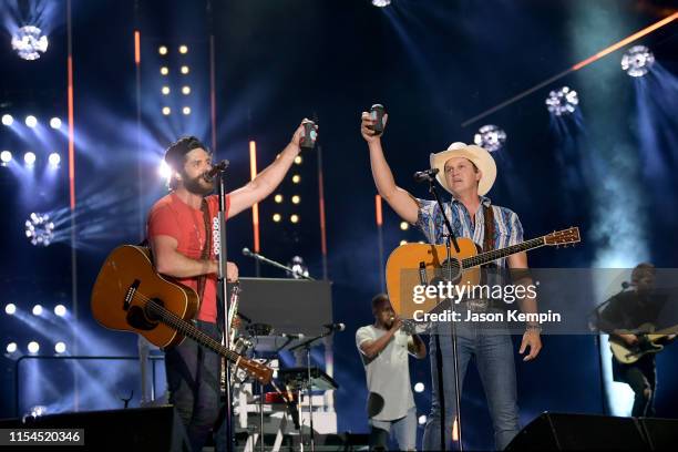 Thomas Rhett and Jon Pardi perform on stage during day 2 for the 2019 CMA Music Festival on June 07, 2019 in Nashville, Tennessee.