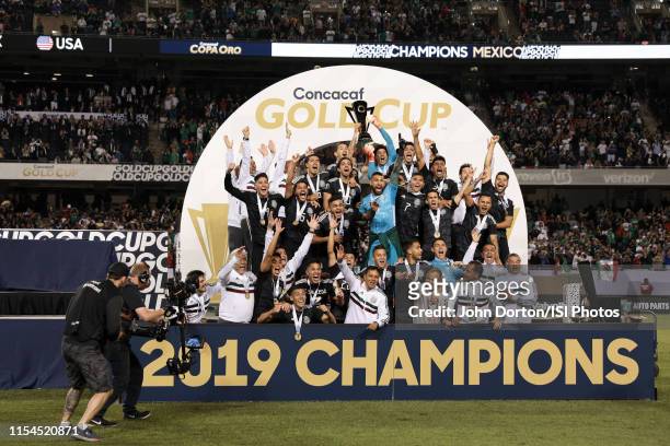 Mexico celebrates winning the 2019 CONCACAF Gold Cup finals between the United States and Mexico at Soldier Field on July 07, 2019 in Chicago,...