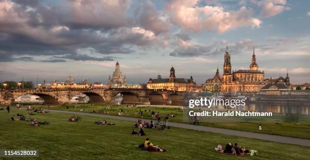 historic city center at river elbe in the evening, dresden, saxony, germany - dresda foto e immagini stock