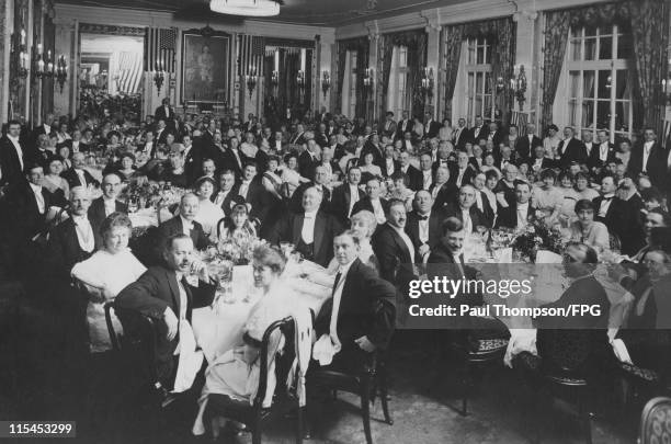 Guests seated at tables during a banquet held for US hotel owners, in the presence of the US ambassador, at the Hotel Adlon in Berlin, Germany, 4 May...