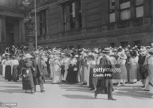 Crowds of people queueing to see the wedding dress of Princess Victoria Louise of Prussia on display at the Museum of Decorative Arts in Prinz...