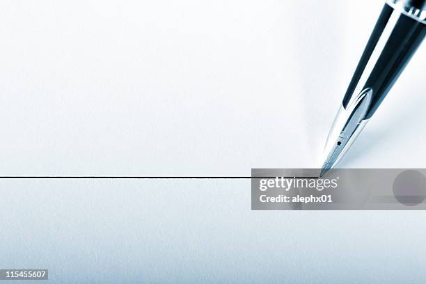 a pen drawing a precision point line on white paper - filling stock pictures, royalty-free photos & images