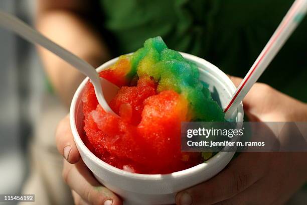rainbow snow cone - snow cones shaved ice stock pictures, royalty-free photos & images