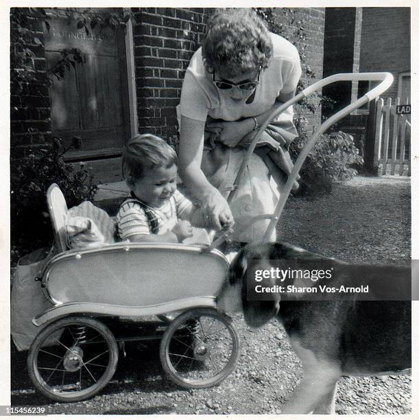 baby boy in pushchair with his mother - archival stock pictures, royalty-free photos & images