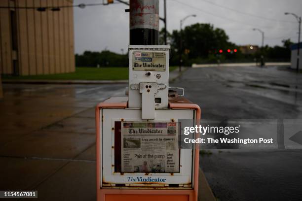 Paper box outside The Vindicator in Vindicator Square in the rain on July 2, 2019.