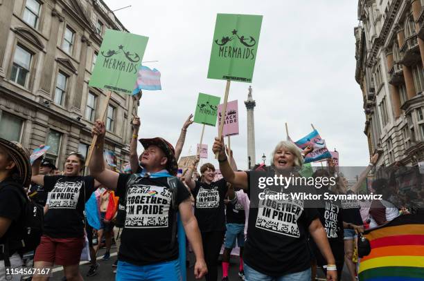 Members of Mermaids UK, a charity supporting gender-diverse and transgender children, take part in the Pride in London parade on 06 July, 2019 in...