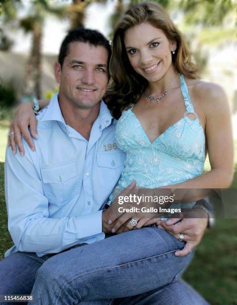 South African celebrity couple Amor Vittone and Joost van der Westhuizen pose for a photo on July 22, 2005 in Pretoria, South Africa.
