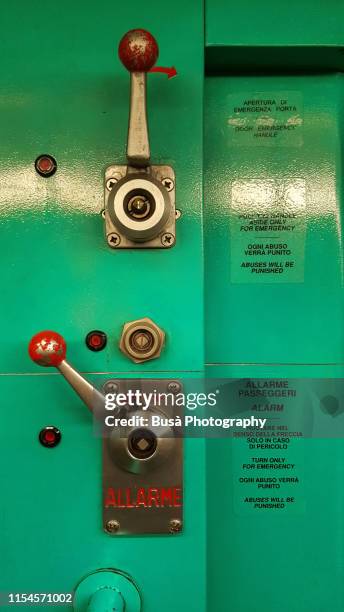 alarm lever / emergency brake on tram in milan, italy - notbremse stock-fotos und bilder