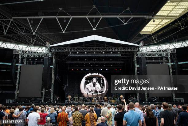 Eddie Vedder performs live on stage supporting The Who during their Moving On tour at Wembley Stadium, London.