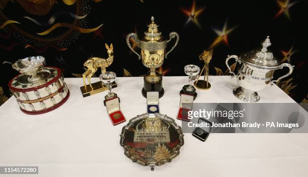 Selection of trophies, awards, and memorabilia from the tennis career of Boris Becker, including the Wimbledon singles trophy , singles runner up...