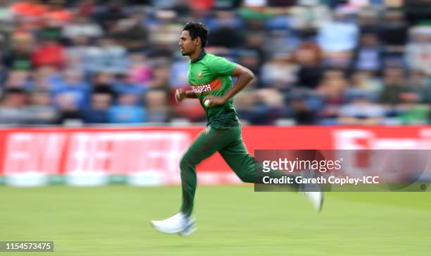 Mustafizur Rahman of Bangladesh runs into bowl during the Group Stage match of the ICC Cricket World Cup 2019 between England and Bangladesh at...