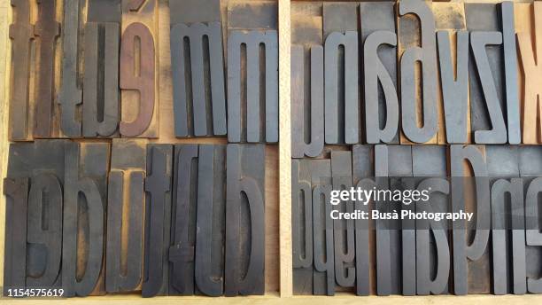 typescript metal letters seen in a flea market - block style font stock pictures, royalty-free photos & images