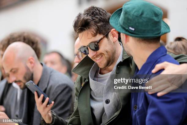 Charlie Teasdale and Finlay Fenwick attend St James's LFWM shows on June 08, 2019 in London, England.