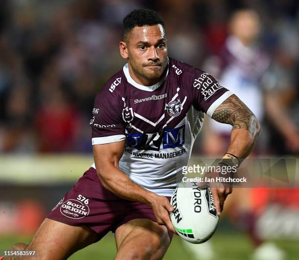 Apisai Koroisau of the Sea Eagles runs the ball during the round 13 NRL match between the North Queensland Cowboys and the Manly Sea Eagles at...
