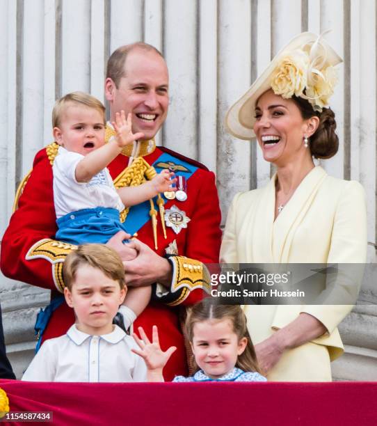 Prince Louis, Prince George, Prince William, Duke of Cambridge, Princess Charlotte and Catherine, Duchess of Cambridge appear on the balcony during...