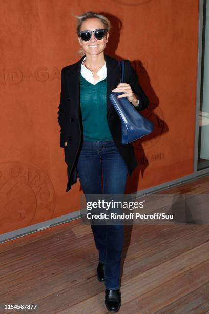 Journalist Anne-Sophie Lapix attends the 2019 French Tennis Open - Day Fourteen at Roland Garros on June 08, 2019 in Paris, France.