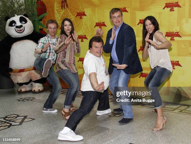 German actors Ralf Schmitz and Cosma Shiva Hagen, US Actor Jack Black, German actors Hape Kerkeling and Bettina Zimmermann attend the 'Kung Fu Panda...