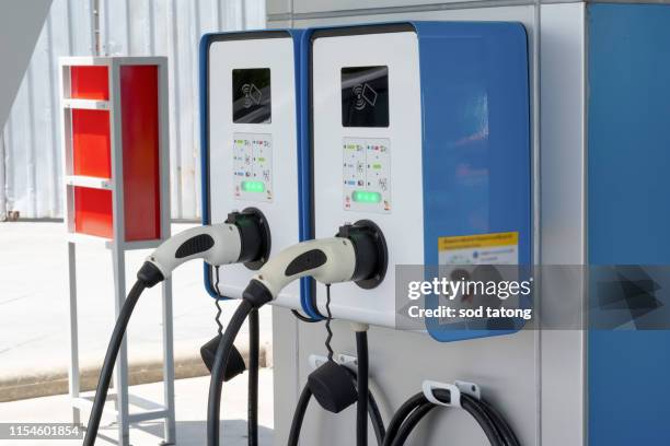 electric car charging station - car electro stock pictures, royalty-free photos & images