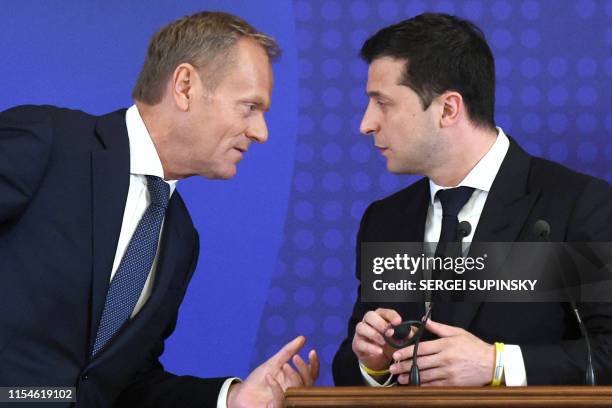 European Council President Donald Tusk speaks to Ukrainian President Volodymyr Zelensky during a press conference on the outcome of the Ukraine-EU...